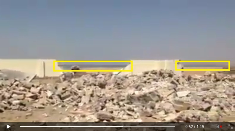 'Yezidi holy place/sacred site Quba Sheikhsin destroyed by IS terrorists. [Von IS-Terroristen zerstörte êzîdîsche Heiligenstätte Quba Sheikhsin.]'<br />(c) Ezidi Press, Facebook, 1. September 2014 (e) - is that water on the horizon?